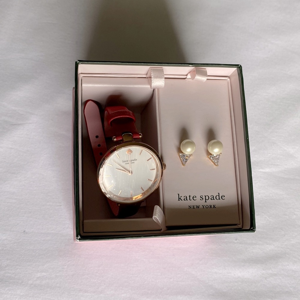 Kate spade Women’s watch with earrings.